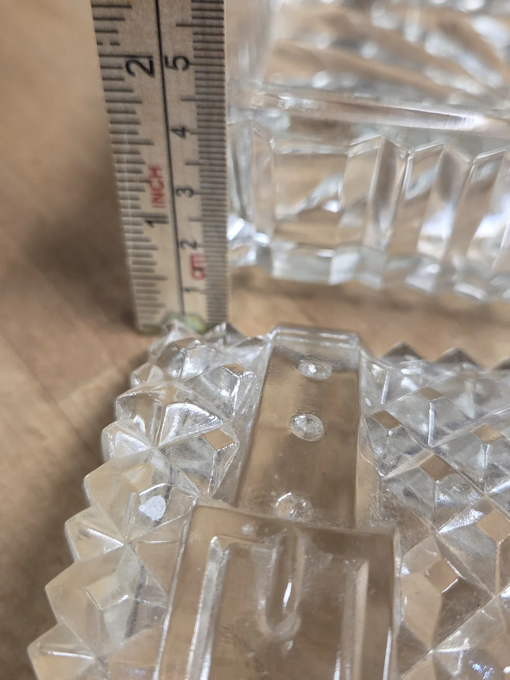 Vintage clear pressed glass trinket box shaped like a miniature treasure chest